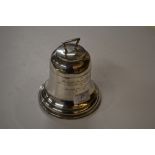 A silver bell shaped desk inkwell with presentatio