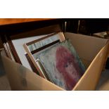 A box of pictures and frames