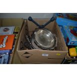 A box of metalware to include a mincer; silver pla