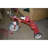 A Radio Flyer trike