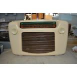 A CB white Bakelite radio