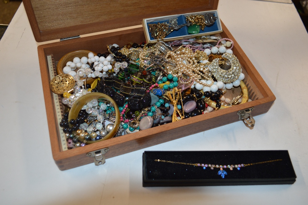 A box of assorted costume jewellery and plated cha