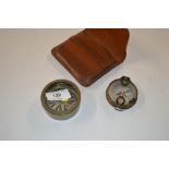 Two brass cased compasses