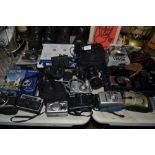 A large quantity of various cameras