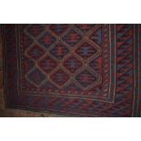 An approx. 4'2" x 3'7" Gazak rug