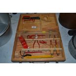 A child's wood working tool set