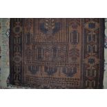 An approx. 4'4" x 2'8" old Beluchi rug