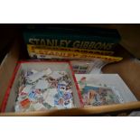 A box containing loose stamps, covers and catalogu