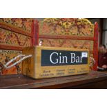 A novelty wooden gin bar box