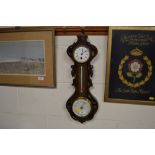 A late 19th Century combined barometer, clock and