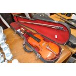 A violin and bow in carrying case