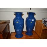 A pair of blue glazed vases, one AF