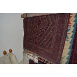 An approx. 4'3" x 3'11" Gazak rug