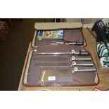 A 9 piece knife set in case (36)