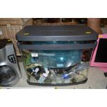 An Aquarium with various accessories, pumps etc