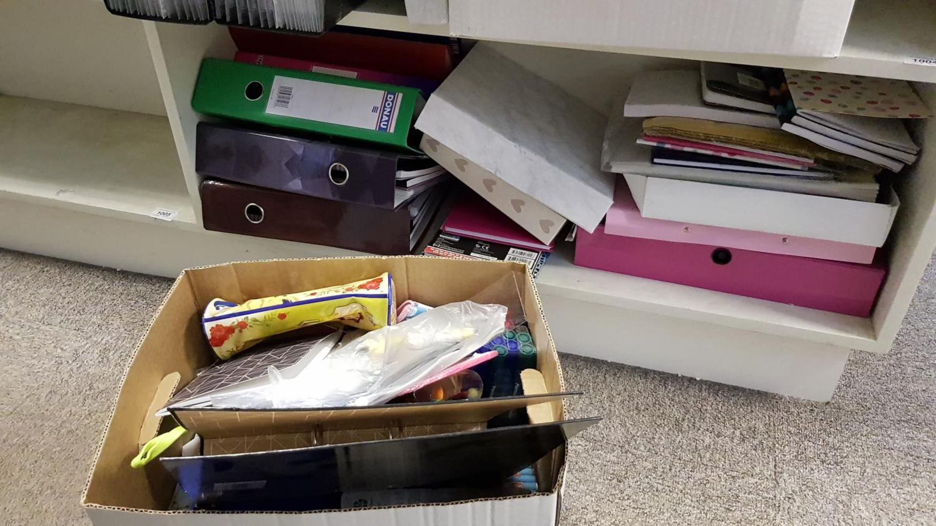 Contents of 2 bottom shelves – mixed stationary/office gear