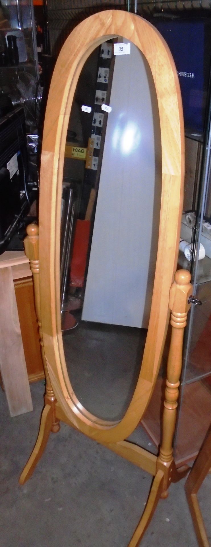 A light oak cheval mirror