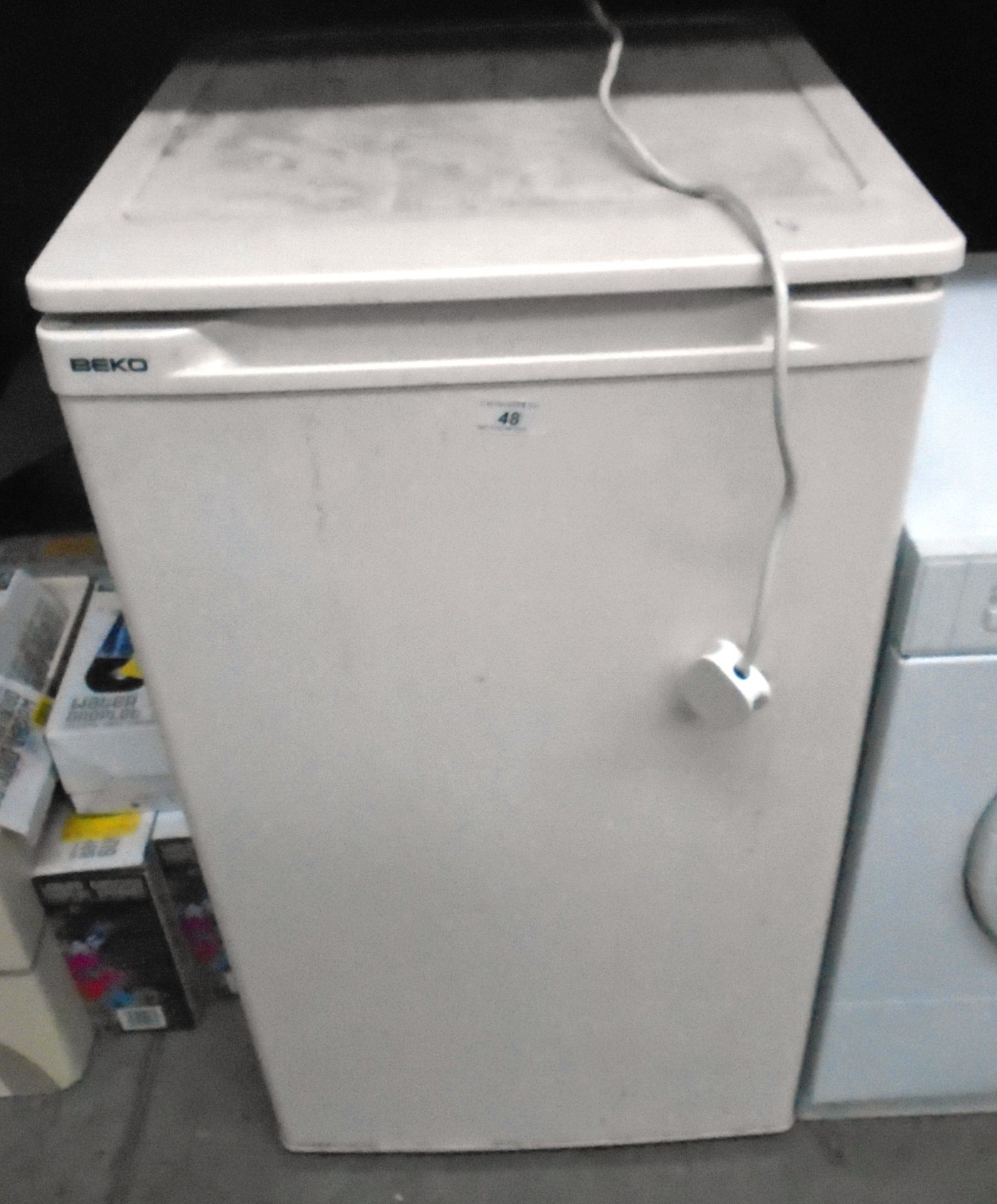 A Beko white under counter fridge