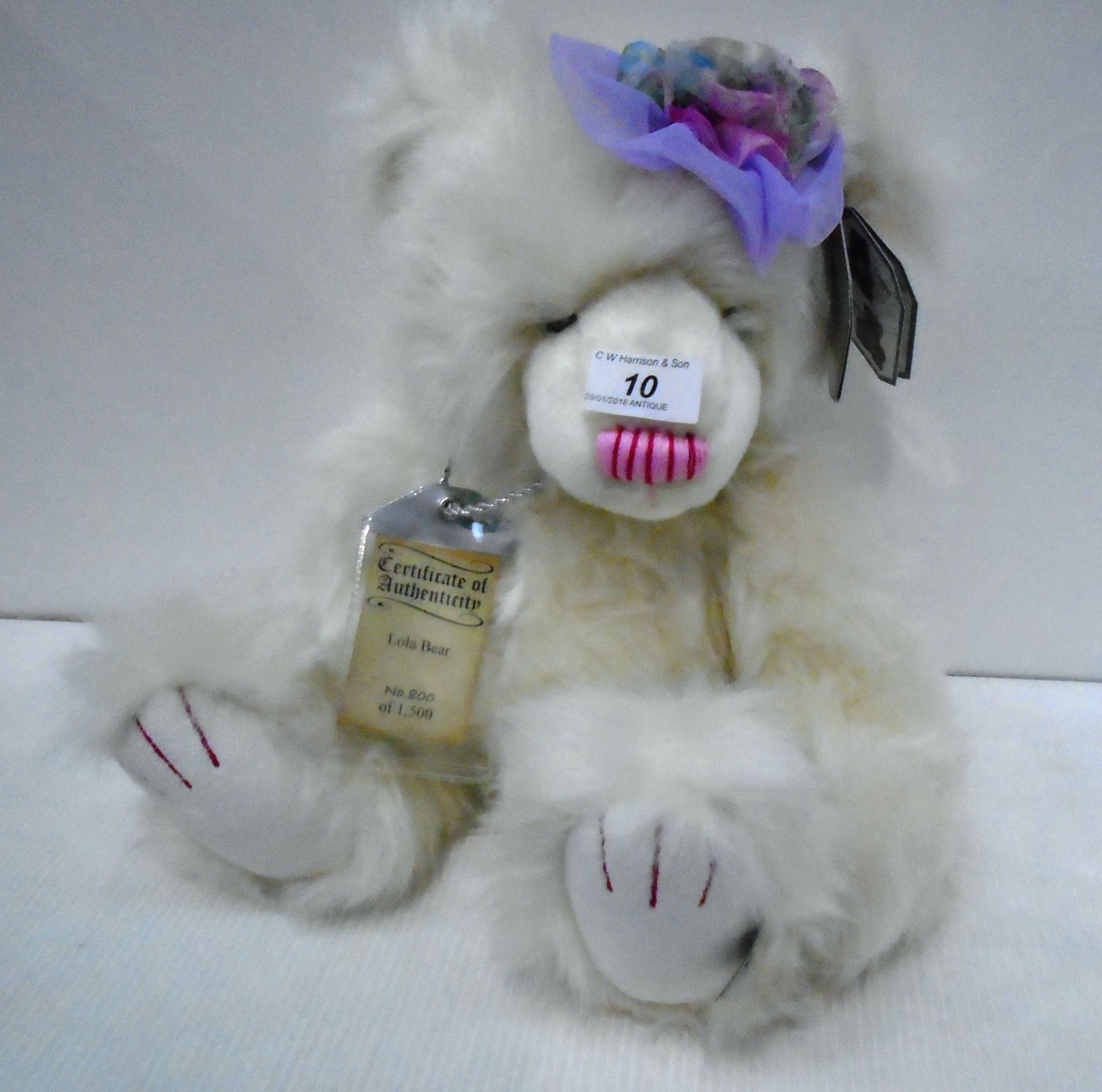 A Silver Tag Bear by Suki ""Lola"" item no. 17109 complete with certificate of authenticity no.