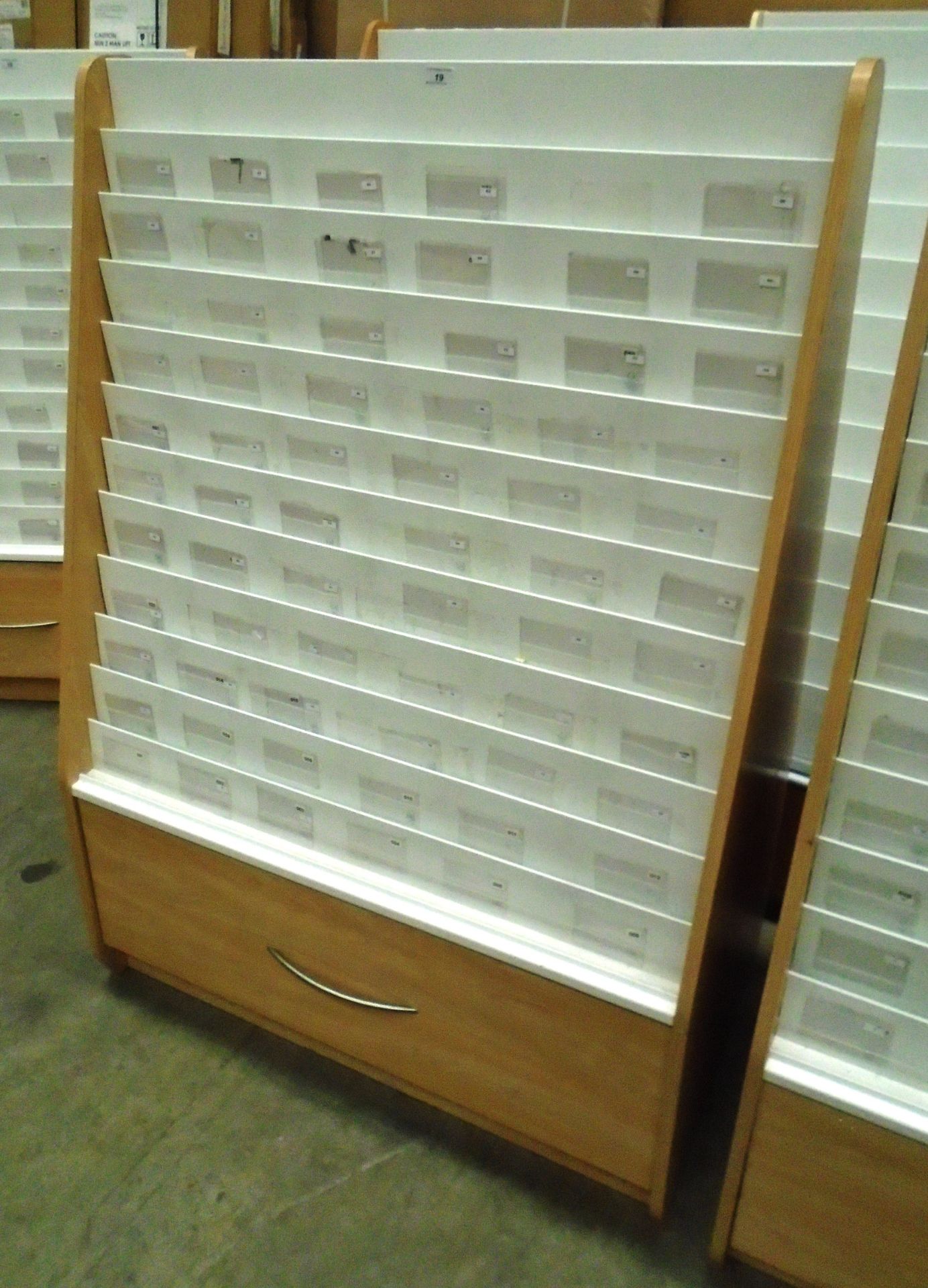 A pine finish double sided 24 section card display rack with storage drawer 100 x 150cm