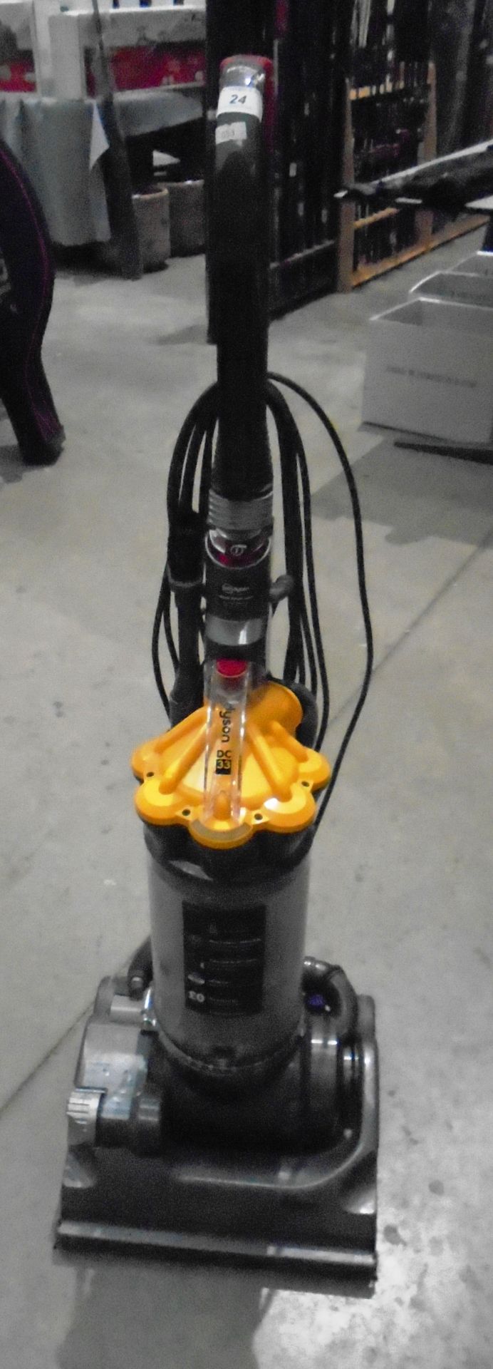 A Dyson DC33 vacuum cleaner