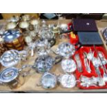 A quantity of plated wares including large quantity of cutlery, three piece fluted tea service,