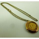 A 1914 sovereign in a 9ct gold pendant on a 9ct gold chain (total approx weight 16.