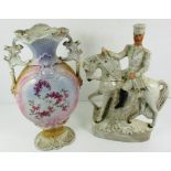 A Staffordshire flatback figure and a two handled vase with floral pattern