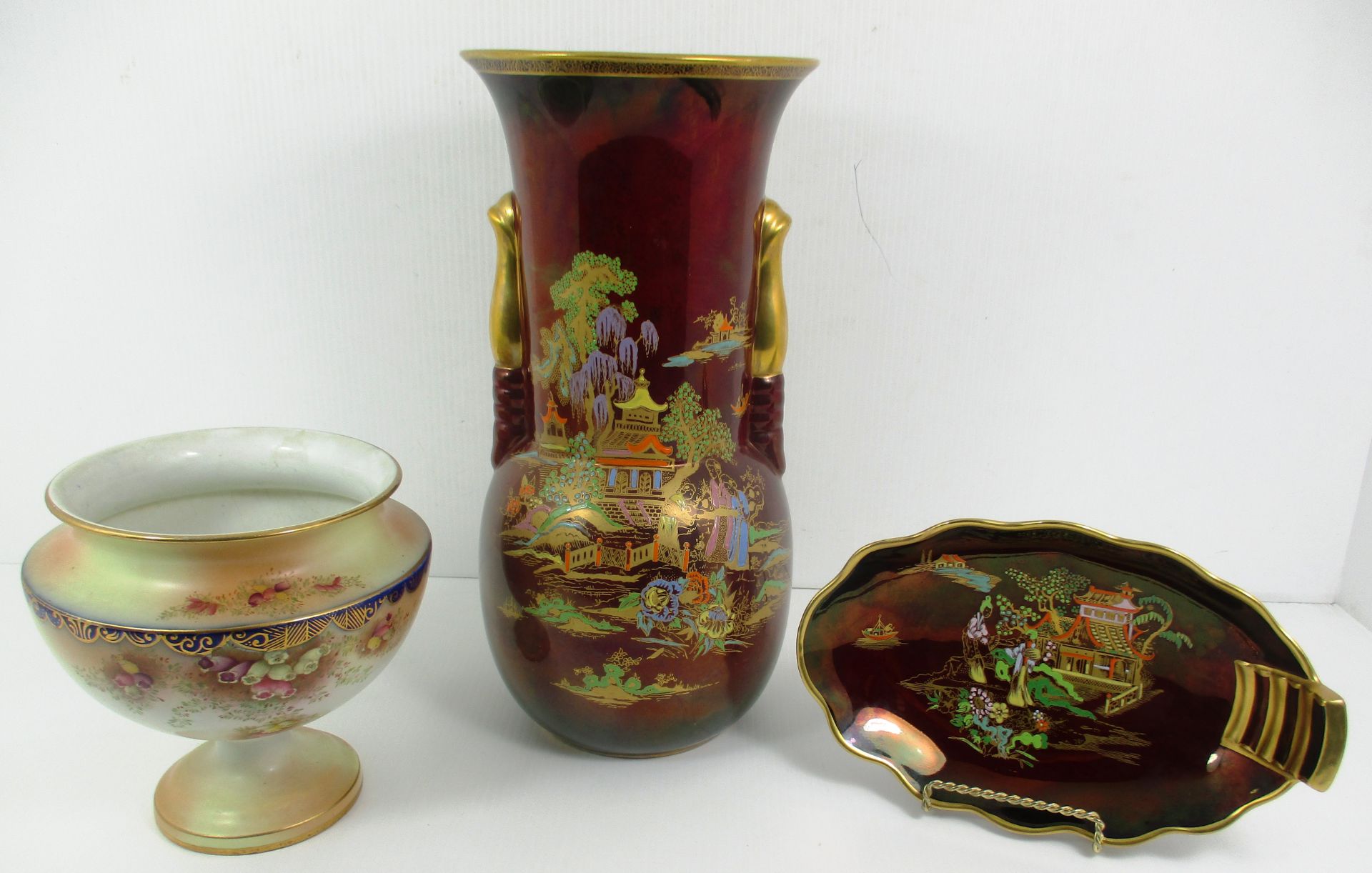 A Crown Devon Fieldings Rouge Royale lustre vase decorated with the "Temple Garden" pattern [31cm