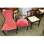 A Victorian mahogany framed nursing chair with pink upholstery,