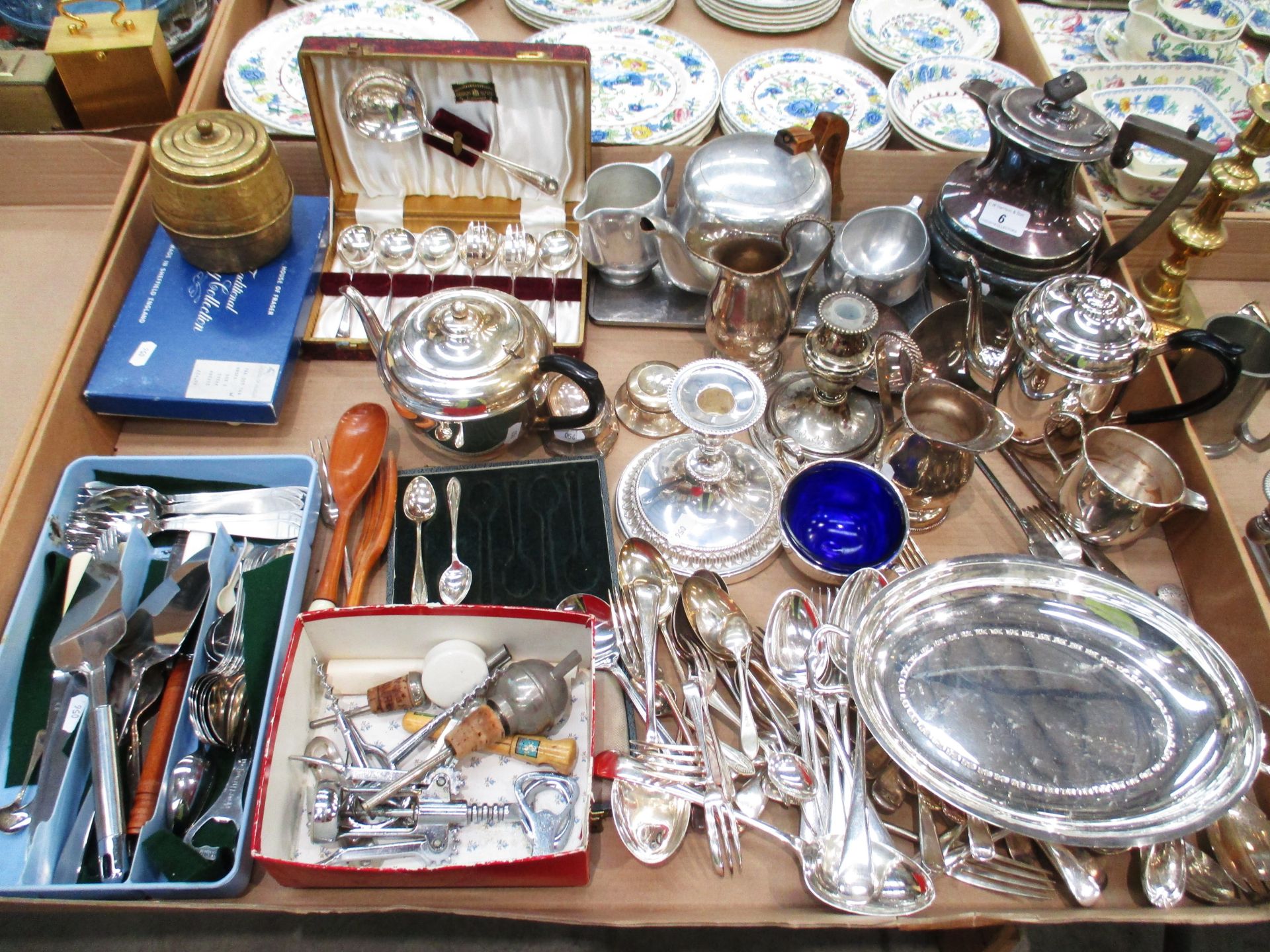 A quantity of assorted plated wares including cutlery, three piece Picquot tea service,