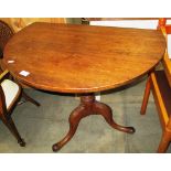 A George III oak tilt top tripod table (top cut)