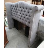 A grey deep buttoned high back 4'6" dralon headboard