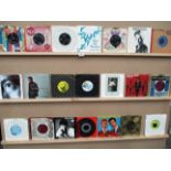 Approximately 180 x 45rpm singles (some 33rpm) - 60s to 80s pop and rock - Status Quo, Beatles,