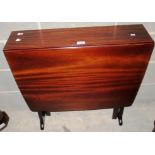 A mahogany drop leaf Sutherland style table