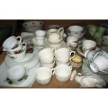 A large quantity of assorted part tea sets including one with hunting pattern