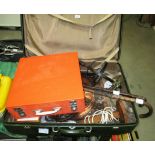 A Sirran picnic set and a suitcase containing wooden table lamp, walking stick,