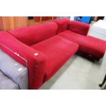 A chrome framed 2 piece 'L' shaped settee with red upholstery