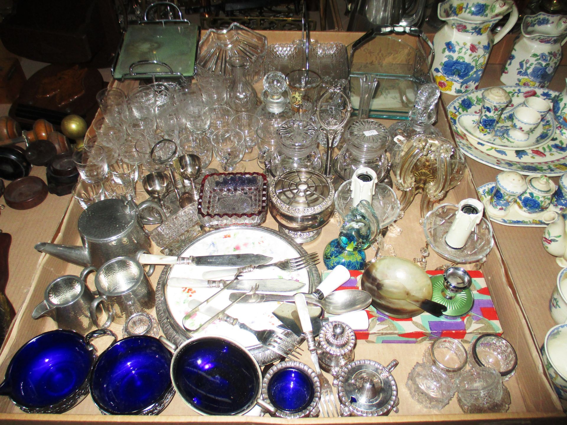 A large quantity of assorted glassware including small decanters, small quantity of plated wares,