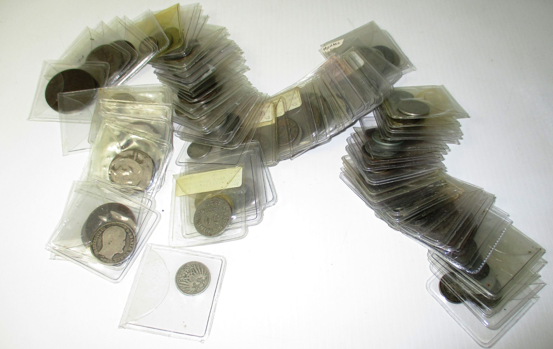 Contents to small box - a good lot of world coins in sleeves, 19th-20th century,