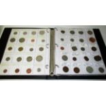 Coin album with a collection of over 320 world coins including British Colonial, Victorian,