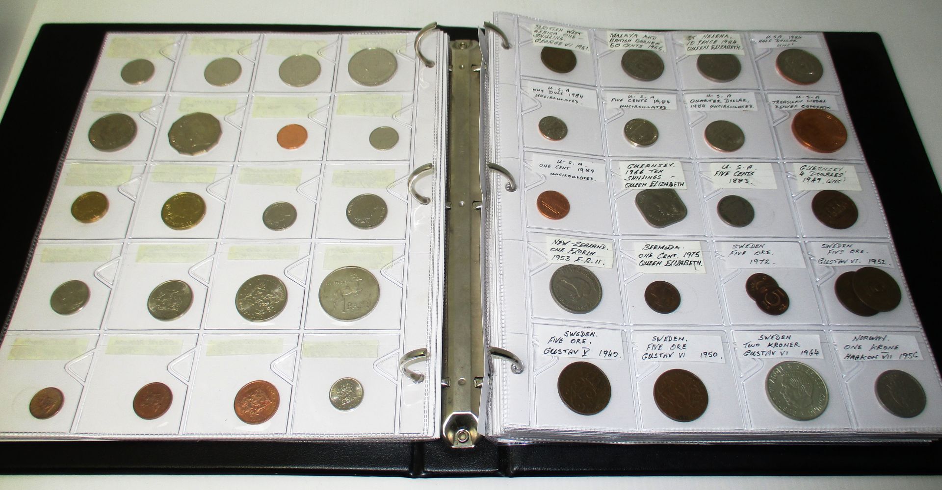Coin album with a collection of over 320 world coins including British Colonial, Victorian,