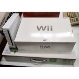 A Nintendo Wii gaming console model RVL-001 EUR complete with stand, 2 remote controls,