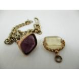 Two 9ct gold watch fobs with stones and a 9ct gold coloured chain