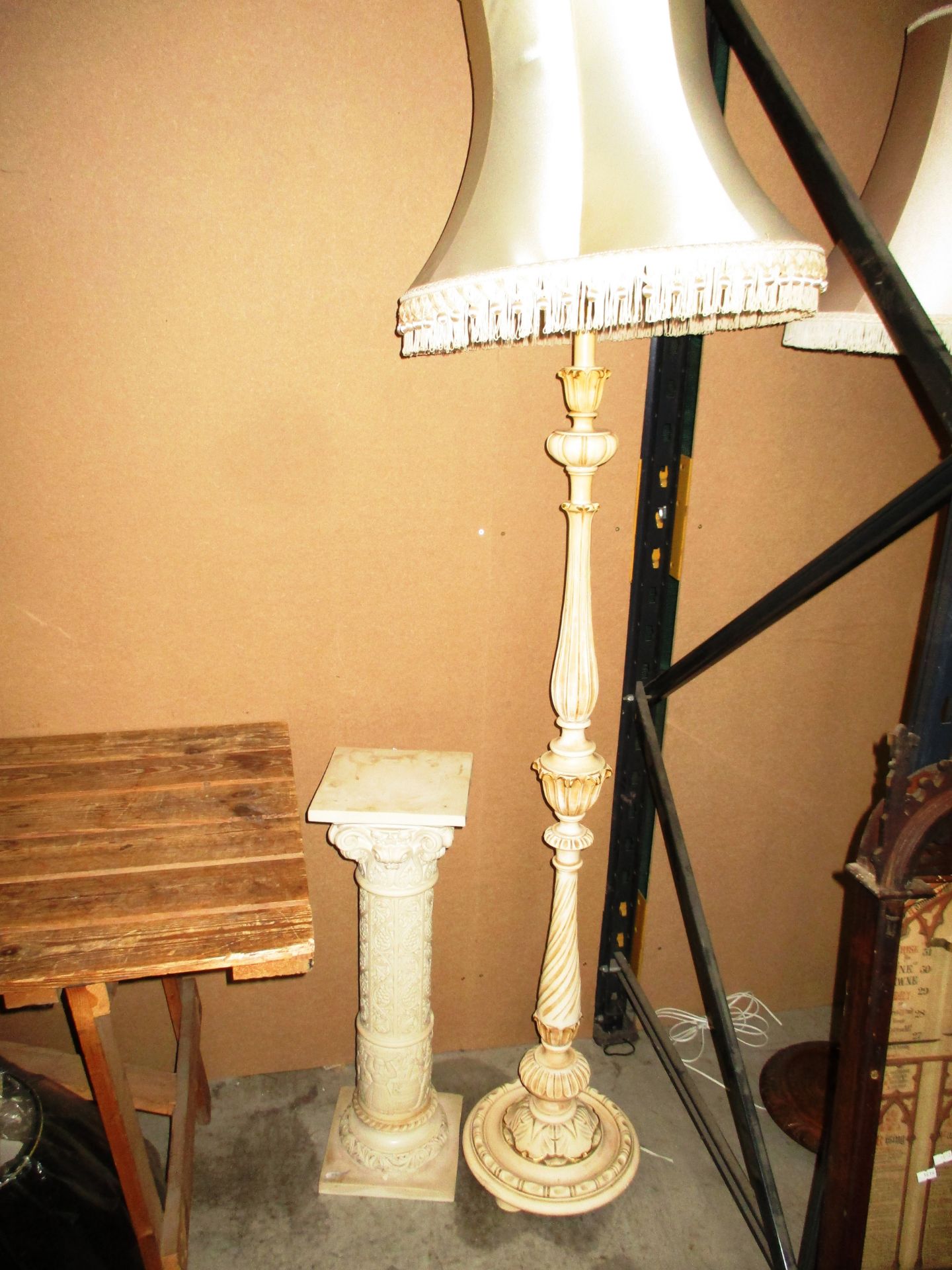 A resin heavily decorated column/pillar and a resin standard lamp with shade