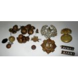 A small quantity of military badges and buttons
