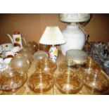 A set of 6 glass light shades, a set of 4 glass lamp shades, a diamond cut glass bowl ceiling light,