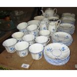 60 x piece Victorian China tea set decorated with blue and white floral pattern