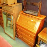 A pine bureau with fall flap over 3 drawer base,