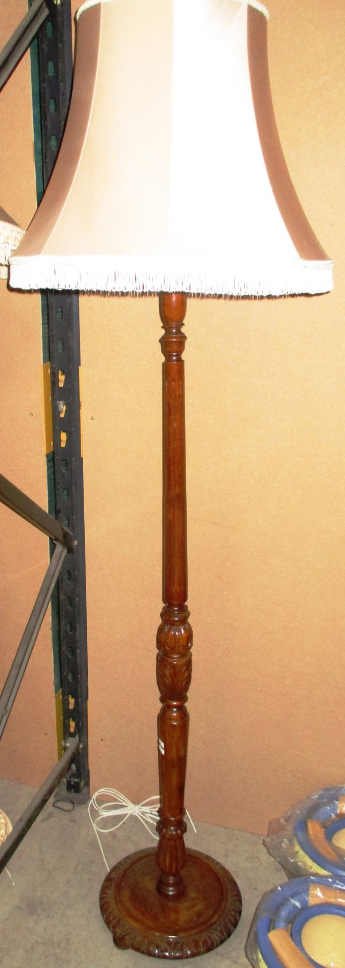 A mahogany carved standard lamp with shade (no test - flex cut off)
